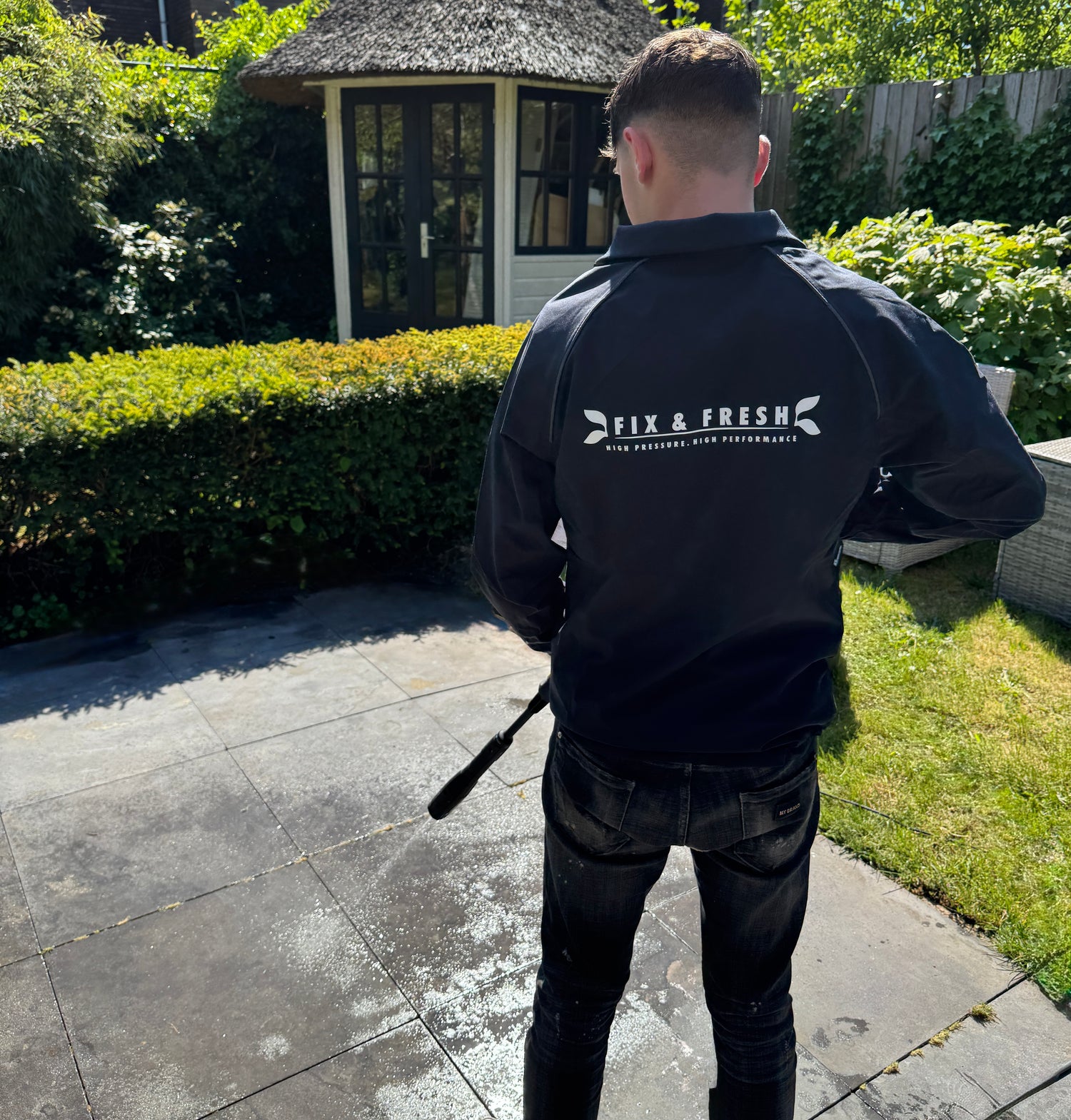 Fix en Fresh hogedruk reiniging team terras, oprit, auto